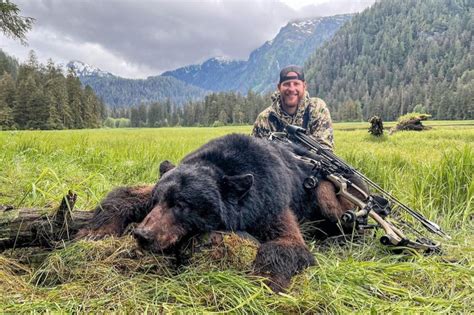 Liberal Public Slams NFL QB Carson Wentz For Killing A Bear With Arrow & Posting Photos With It ...