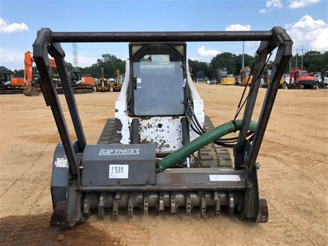 BOBCAT T300 SKID STEER LOADER, VIN/SN:525412136 - CRAWLER, LOFTNESS MULCHING HEAD, CAB, A/C, METER R