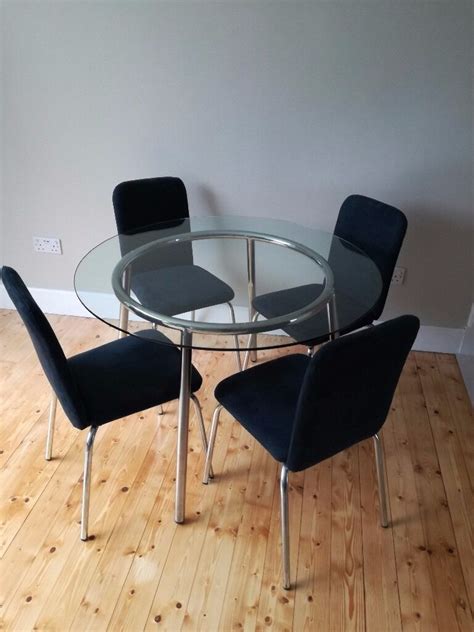 Ikea Salmi glass dining table and 4 Ikea Sixten Chairs | in Bearsden, Glasgow | Gumtree