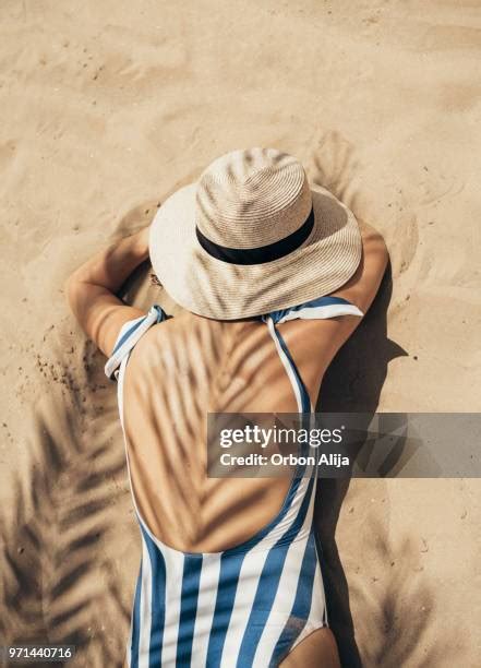 2,199 Woman Lying On Beach Hat Stock Photos, High-Res Pictures, and Images - Getty Images