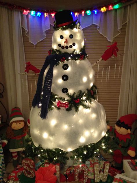 Adorable christmas tree made into snowman. Such a great idea- no hassle ...