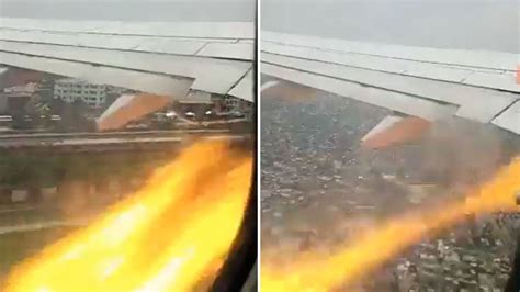 Terrifying moment packed passenger jet’s engine erupts into FLAMES ...