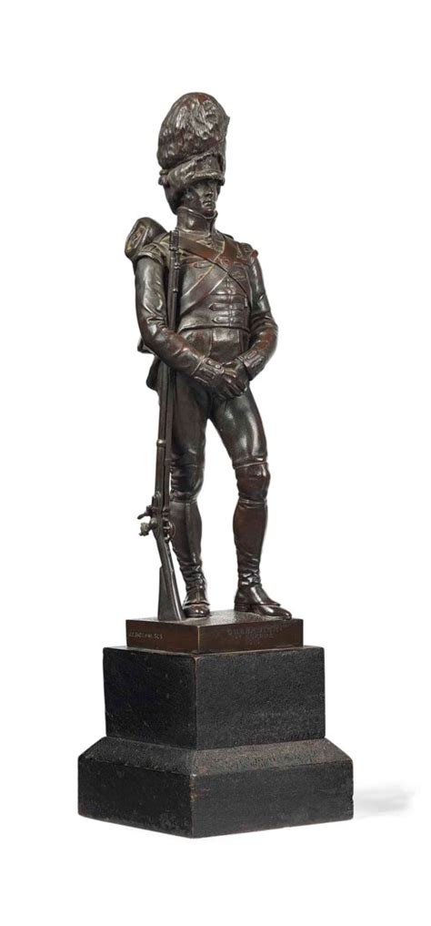 A VICTORIAN BRONZE FIGURE OF A GRENADIER GUARDSMAN