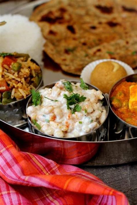 boondi raita recipe, a simple, cooling, flavorful, yogurt based side served with paratha or ...