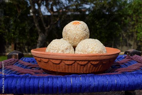 Tilgul ladoo recipe. white sesame seeds coated with jaggery sugar ...