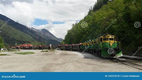 Skagway Alaska Train and Mountains Editorial Stock Photo - Image of ...