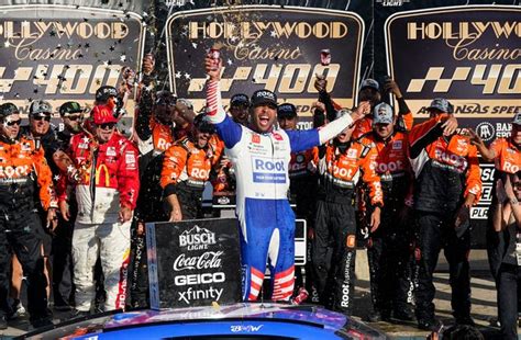 Bubba Wallace wins NASCAR race at Kansas, holding off title contenders