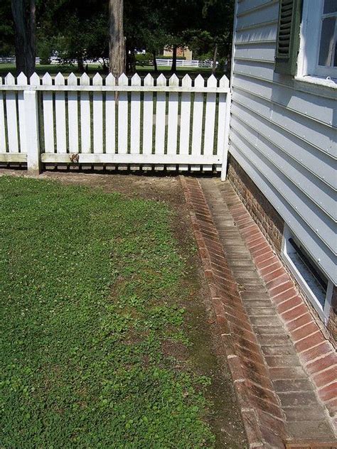 fence and ground gutter | Backyard landscaping, Backyard, Yard drainage