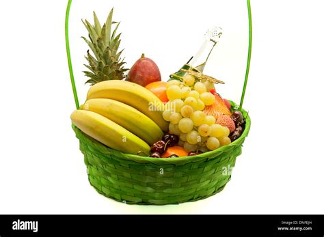 basket full of fruits on a white background Stock Photo - Alamy