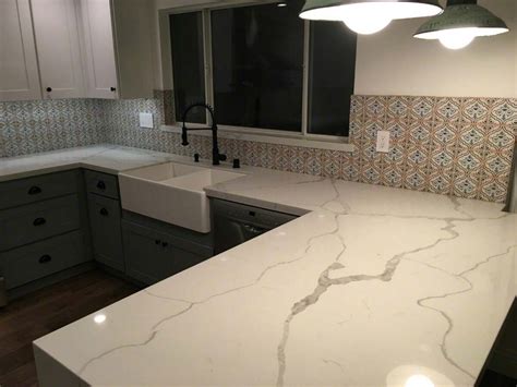 Kitchen With Quartz Countertop And Backsplash Arabesque Tile ...