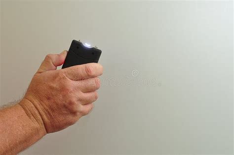 A handheld taser stock image. Image of protect, electroshock - 71385443