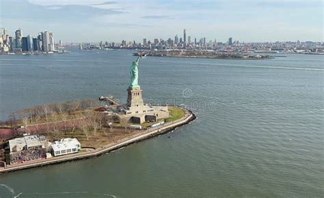 The Aerial View of Statue of Liberty and Manhattan, Taken from a ...