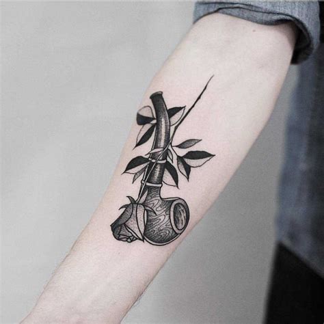 Pipe and rose tattoo by Jonas Ribeiro - Tattoogrid.net