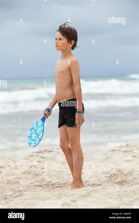 happy little child kid boy playing beachball on beach in summer Stock Photo - Alamy