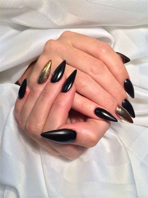 Pin by Alex Freeland on My nails | Gold stiletto nails, Black and gold stiletto nails, Black ...