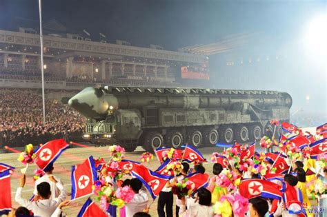 Bangkok Post - Kim Jong Un oversees military parade with new drones, ICBMs