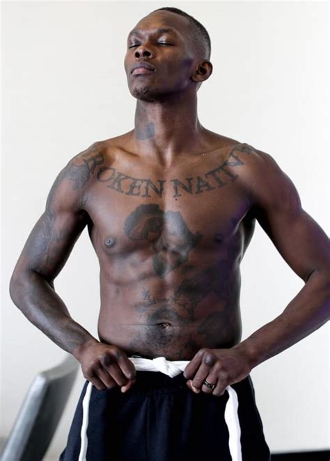 Israel Adesanya Tattoos / Adesanya To Face Gastelum For Interim Middleweight Belt ... - A lot of ...