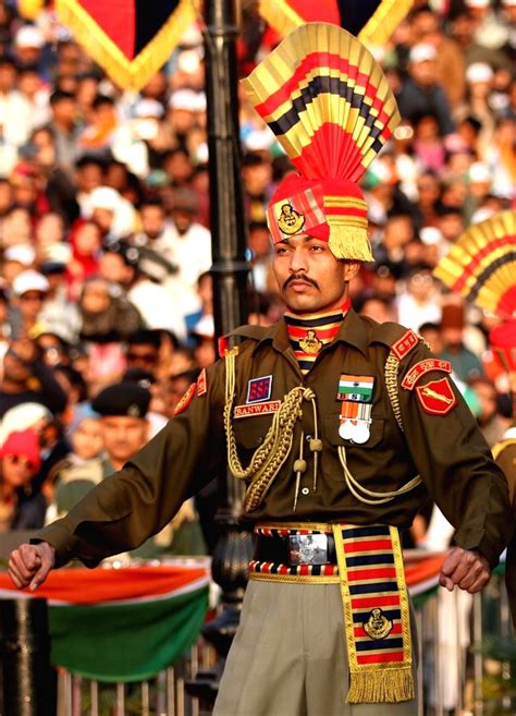 A Border Security Force(BSF) personnel perform during the beating retreat.