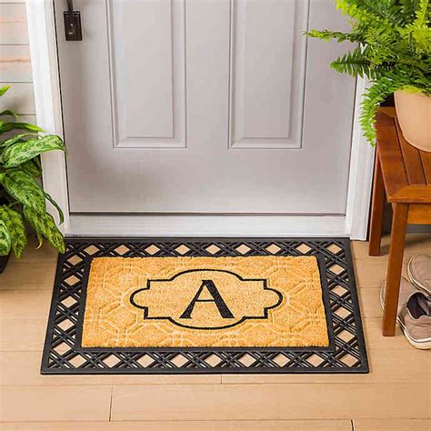 Evergreen 16" x 28" Embossed Flocked Monogram Door Mat Insert in Black | Bed Bath & Beyond ...