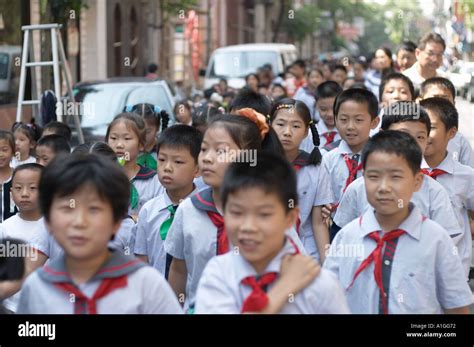 chinese school children on the street of shanghai china Stock Photo: 3346545 - Alamy