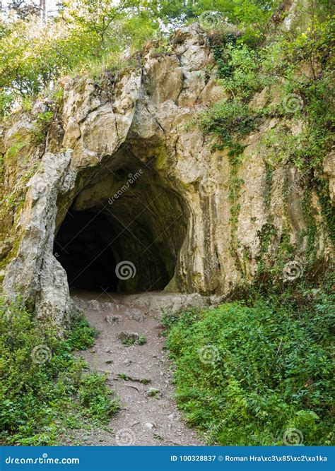 Dark rocky cave entrance stock image. Image of hiking - 100328837