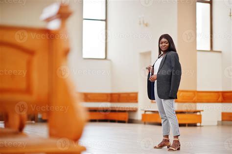 African american woman praying in the church. Believers meditates in ...