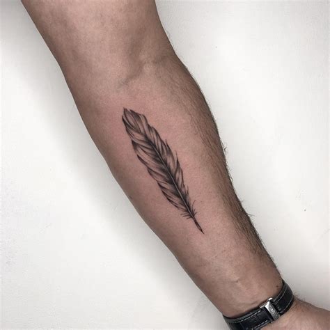 Feather tattoo by Conz Thomas - Tattoogrid.net