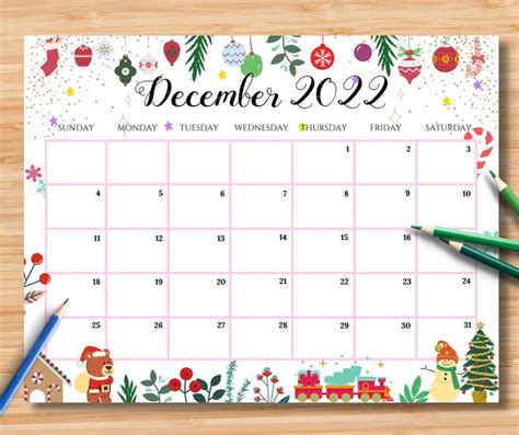 a desk calendar with christmas decorations on it