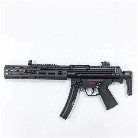 Mp5 airsoft AEG front handguard with mlok compatible accessory holes. Good for longer inner ...