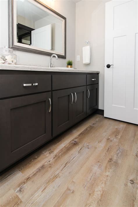 Bathroom with vinyl plank flooring - financesno