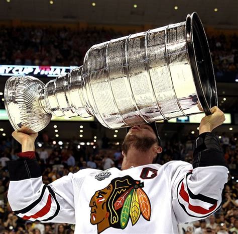 Jonathan Toews Hoisting & Kissing The Stanley Cup - 2013 | HockeyGods