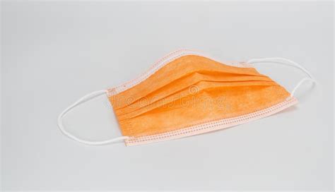 Medical Sterile Disposable Mask, White Background. Orange Surgical Mask, Cover Mouth and Nose ...