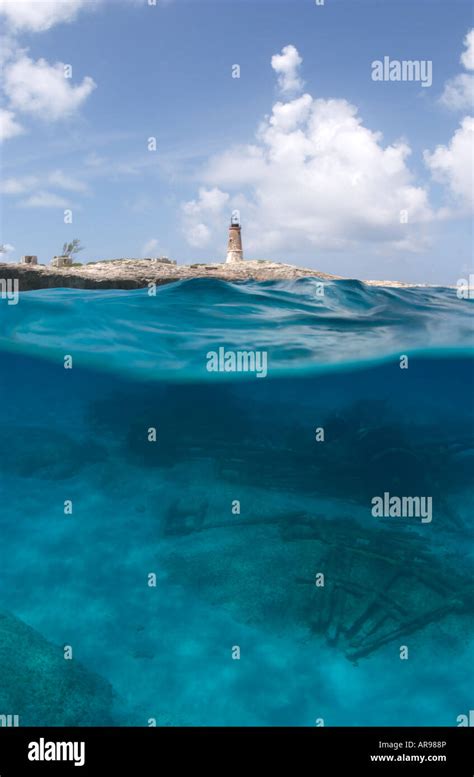 Under over divers on paddlewheelt shipwreck Elbow Cay lighthouse Cay Sal Bank Bahamas Stock ...