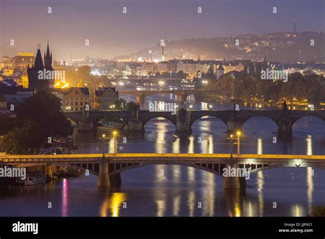 Bridges on Vltava river at night Stock Photo - Alamy