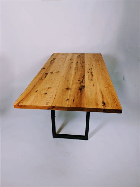 Custom Reclaimed Wood Dining Table - Metal Base by SOMCO Furniture | CustomMade.com