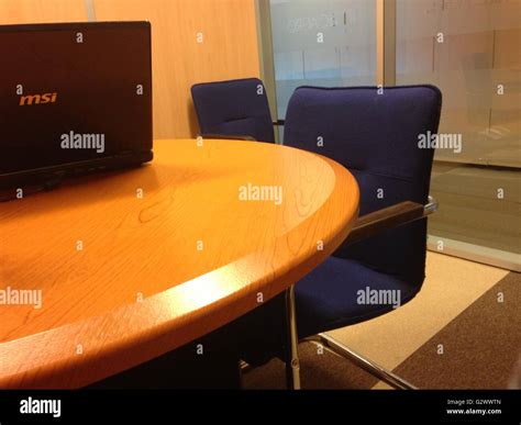 Laptop on office desk Stock Photo - Alamy