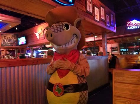 Andy the Armadillo, the mascot of Texas Roadhouse, visited our table.