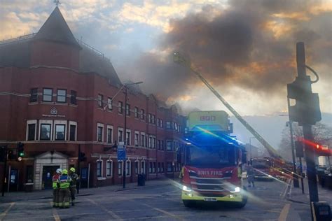 London Forest Gate police station on fire as smoke seen rising from roof