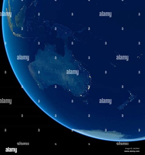 Australia at night, satellite image. City lights (yellow) show areas of ...