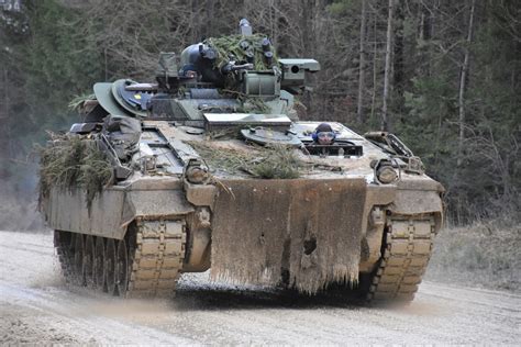 DVIDS - Images - German armored vehicles navigate slippery terrain at ...