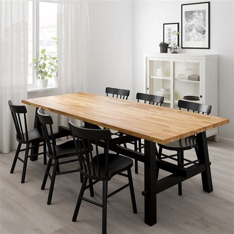 SKOGSTA / NORRARYD Table and 6 chairs - acacia/black - IKEA