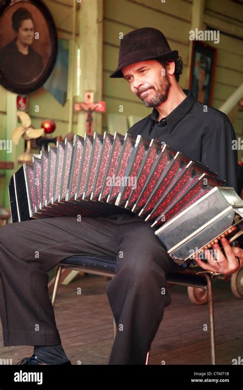 young bandoneon tango player at caminito. La Boca, Buenos Aires Stock Photo - Alamy