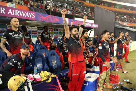 Virat Kohli celebrates from the dugout after RCB's win | ESPNcricinfo.com