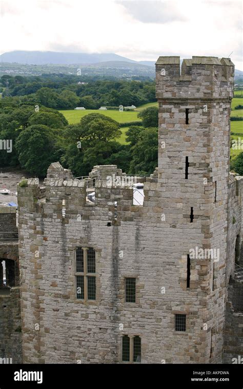 Aerial view of Caernarfon Castle with River Arfon and Snowdonia ...