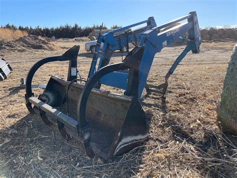 New Holland 7314 Front End Loader W/Grapple BigIron Auctions