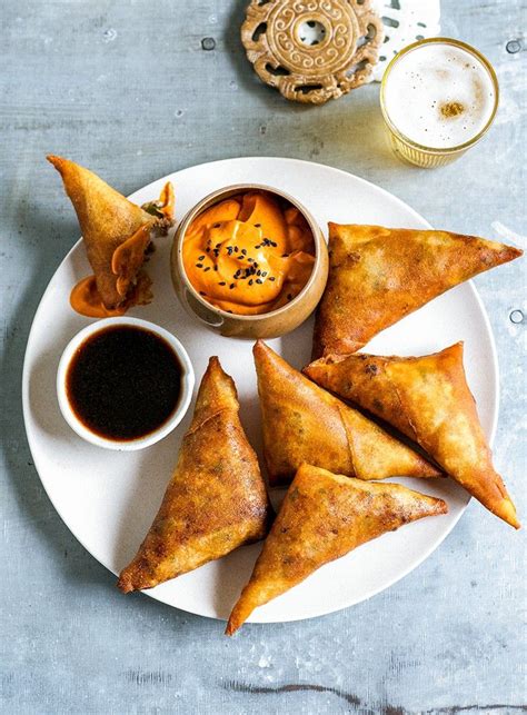 Spicy Pork Samosas with Dipping Sauces | Spicy pork, Food, Ingredients ...