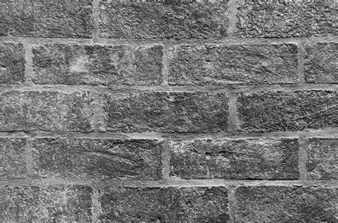 Black brick wall interior background 20041637 Stock Photo at Vecteezy