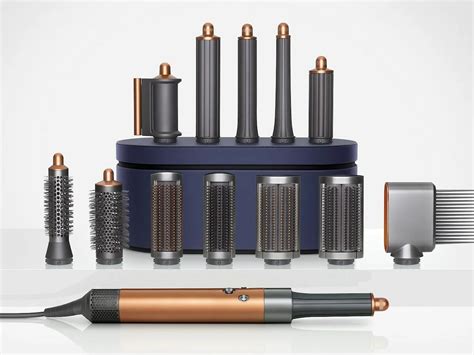 Dyson Next-Generation Airwrap has barrels to curl along with brushes to smooth & volumize ...