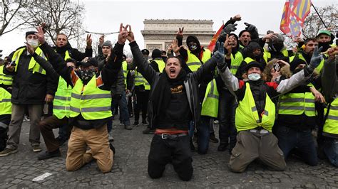 Paris yellow vest protest bring rioting, police tear gas in France