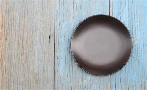 Round black plate 1946471 Stock Photo at Vecteezy